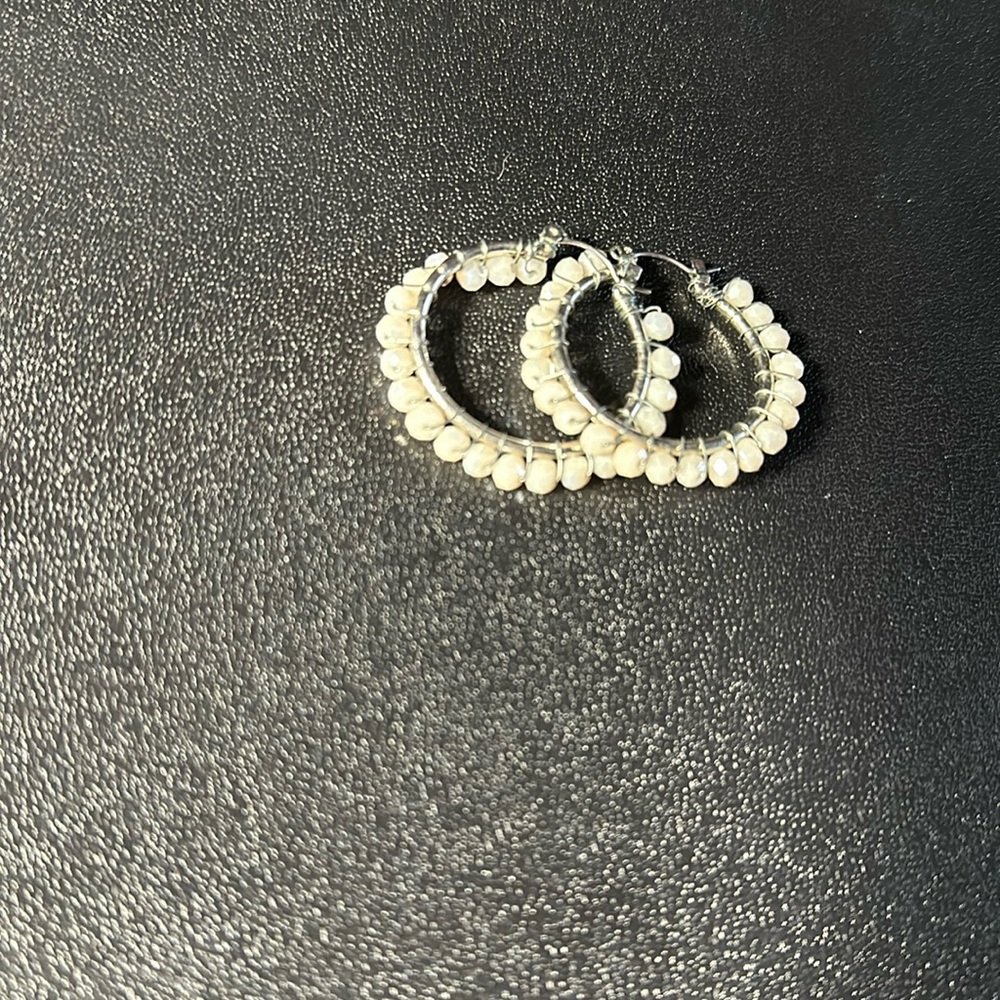 White and silver hoop earrings